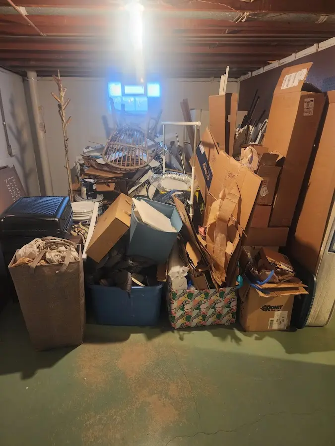 Roll-off dumpster container at job site for 20 Yard Dumpster Rental in Malone